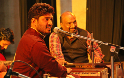 Sunil Sajal at the harmonium during a live ghazal performance