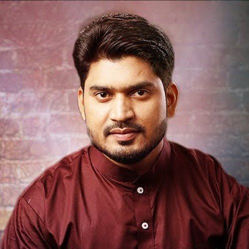 Sunil Sajal wearing a burgundy kurta